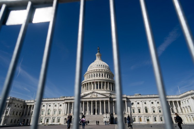 This photo taken on March 21, 2023 shows metal barricades placed near the Capitol building in Washington, D.C., the United States. (Xinhua/Liu Jie)