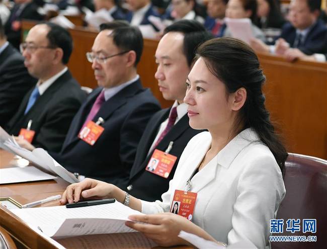 (兩會·圖片故事)(1)全國人大代表王欣會:讓自閉癥兒童融入社會生活