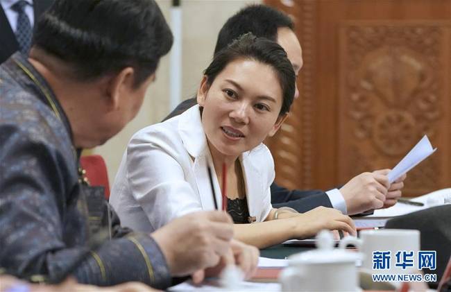 (兩會·圖片故事)(2)全國人大代表王欣會:讓自閉癥兒童融入社會生活