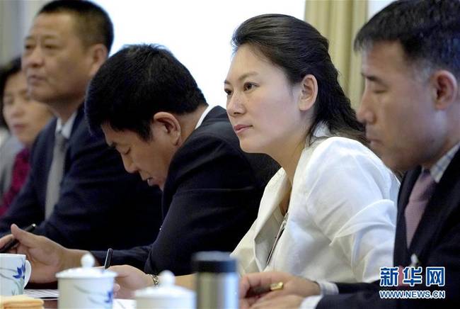 (兩會·圖片故事)(3)全國人大代表王欣會:讓自閉癥兒童融入社會生活