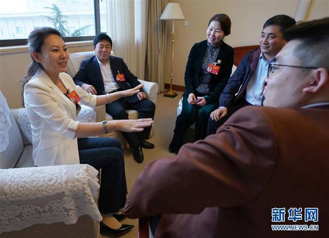 (兩會·圖片故事)(4)全國人大代表王欣會:讓自閉癥兒童融入社會生活