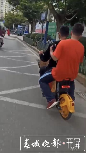 圖方便市民載人騎行共享電動(dòng)助力車