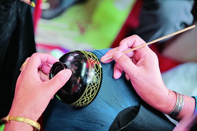 四川:?jiǎn)拘盐幕洃?融入當(dāng)代生活 四川:?jiǎn)拘盐幕洃?融入當(dāng)代生活