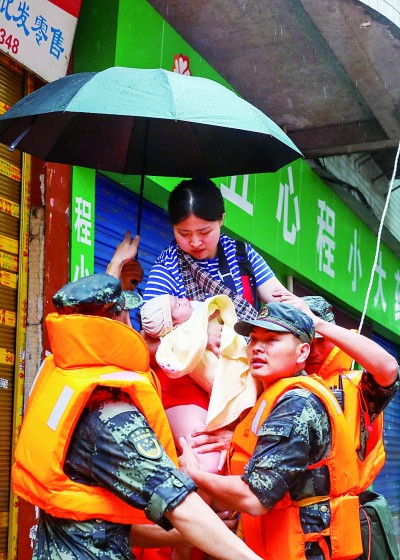 力保安瀾 人民至上——抗洪精神述評(píng)