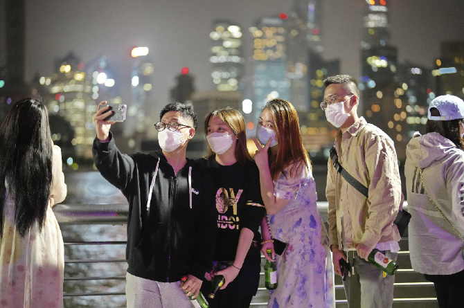 【組圖】上海全面有序復(fù)工復(fù)產(chǎn)復(fù)市 街頭“煙火氣”回歸